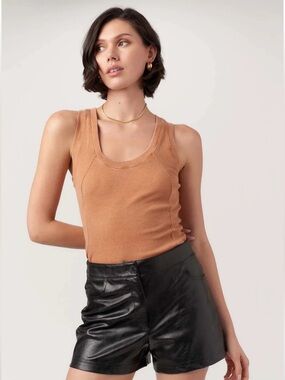 Porta Seamed Burnout Rib Tank is a fitted racerback made from soft burnout rib.